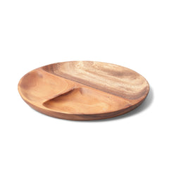 Round acacia wood platter with three sections on white background, tilted view