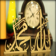 Gold Allah Muhammad calligraphy table decor in front of wooden clock
