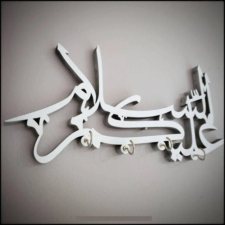 White Assalamualaikum Arabic calligraphy key holder without keys, front view