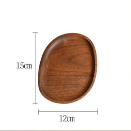 Dimension diagram of small oval contorted wooden tray, 15 by 12 cm