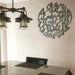 Silver HasbunAllah calligraphy wall art in dining room with pendant lamp