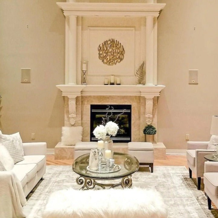 Round Kalma calligraphy wall art above fireplace in cream luxury living room