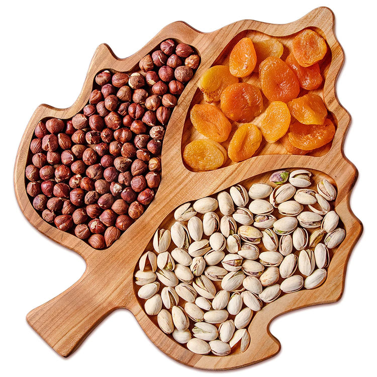 Top view of maple leaf solid wood snack tray with three filled compartments
