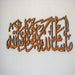 Mashaallah Islamic calligraphy wall decor in brown wood finish on grey wall