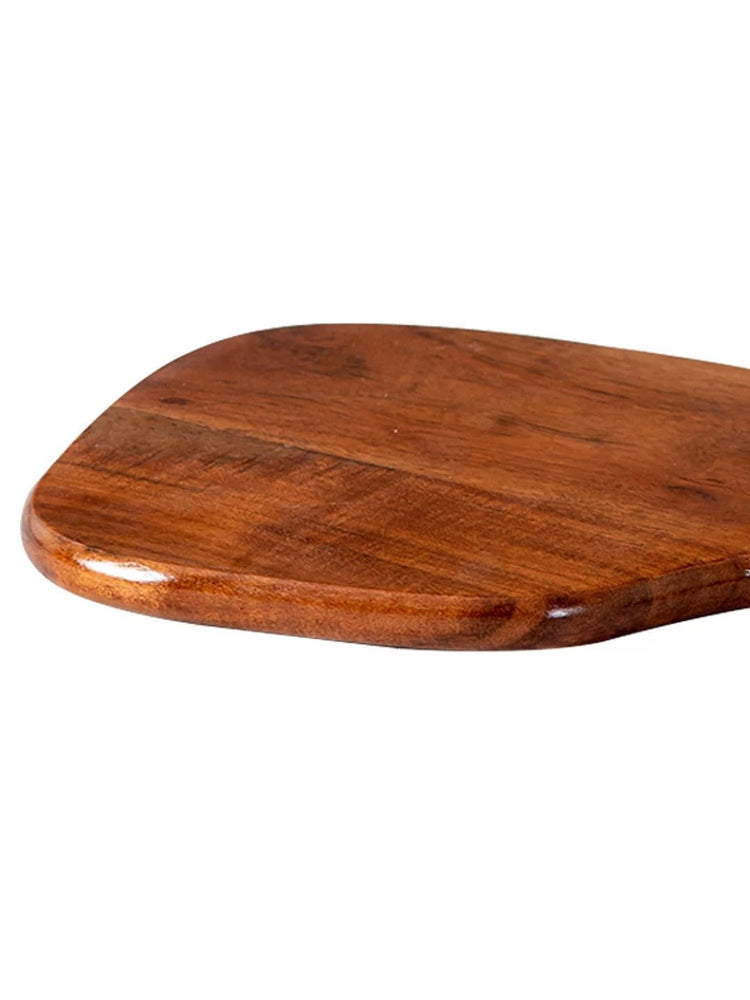 Close-up of smooth rounded edge of solid wood serving tray