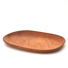 Low side view of oval wooden platter tray showing shallow rim