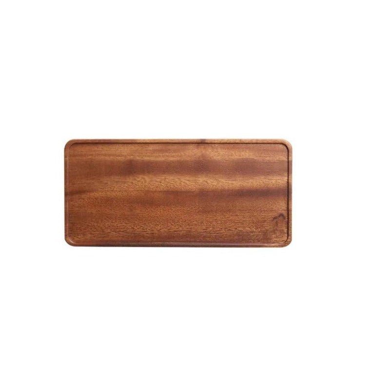 Small rectangular wooden tea tray with rounded corners, top view on white