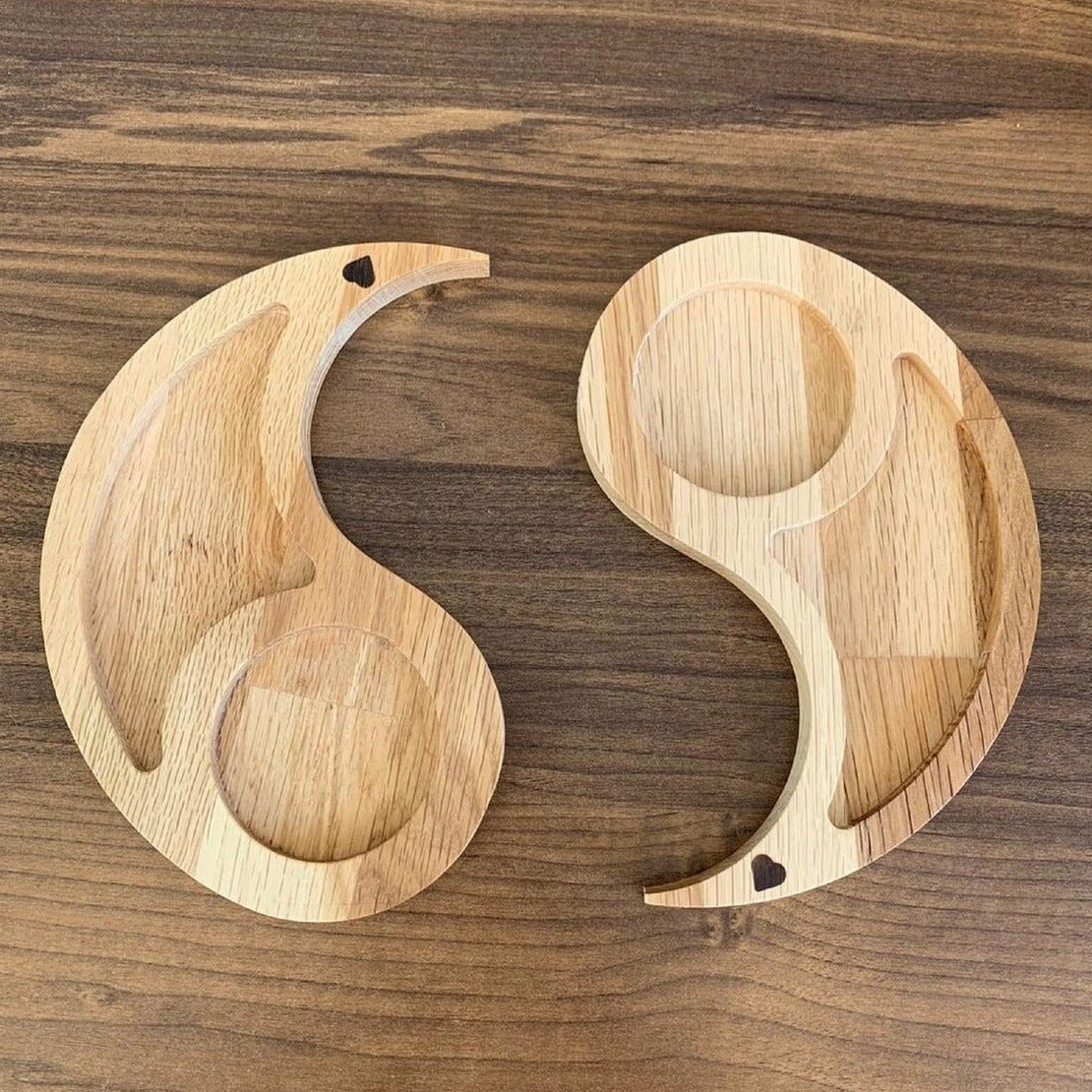Two separated halves of yin yang solid wood serving platter